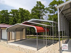 Three metal carports by The Carport Co. stacked on top of each other, the first one possesses a curved AKA regular roof, the second a horizontal a-frame, and the third, a vertical a-frame.