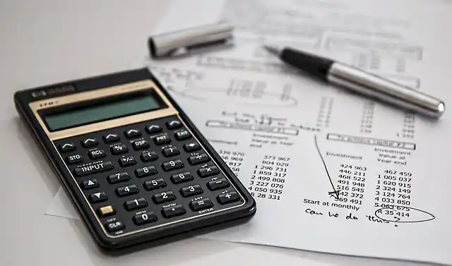 Calculator and accounting sheets to show example of financing or rent to own on a metal carport, garage, shed, lean-to, commercial building or other custom steel structure.