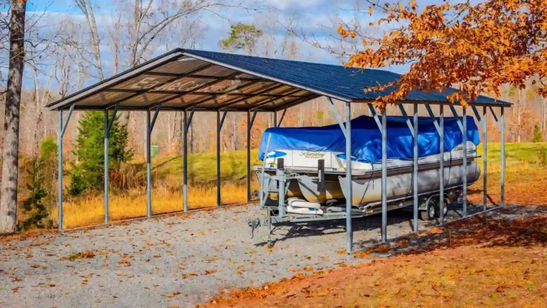Photo of a high quality metal carport built by The Carport Co. It's a two-bay a-frame vertical carport from eagle carports that is covering a boat/pontoon. Eagle Carports is a highly regarded tube frame steel and metal building manufacturer.